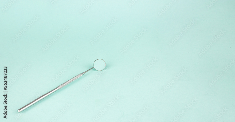 Dentist Professional tools medical equipment on Blue background. Dental Hygiene and Health conceptual image Pile of dentist tools lying on blue background. Dentist Professional tools medical equipment on Blue background. Dental Hygiene and Health conceptual image Pile of dentist tools lying on blue background.
