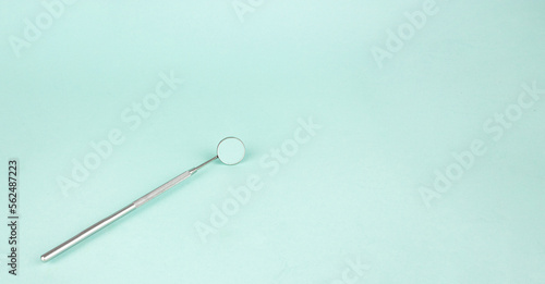 Dentist Professional tools medical equipment on Blue background. Dental Hygiene and Health conceptual image Pile of dentist tools lying on blue background.