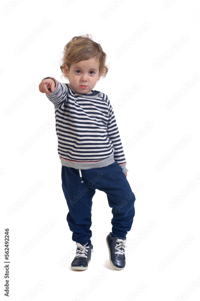 front view of a baby boy pointing on white background front view of a baby boy pointing on white background