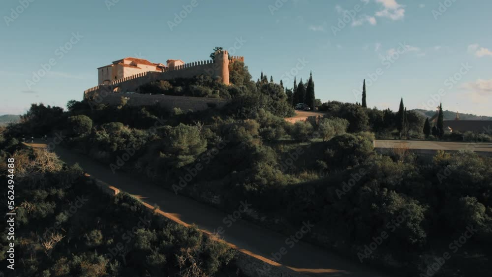 The Sanctuary of San Salvador located on top of hill overlooking the town of Artá, drone point of view during sunny day. Spanish Balearic island of Majorca. Travel destinations and tourism concept
The Sanctuary of San Salvador located on top of hill overlooking the town of Artá, drone point of view during sunny day. Spanish Balearic island of Majorca. Travel destinations and tourism concept