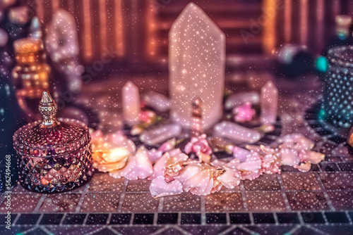 beautiful altar with crystals and rose flowers. magic light effect.