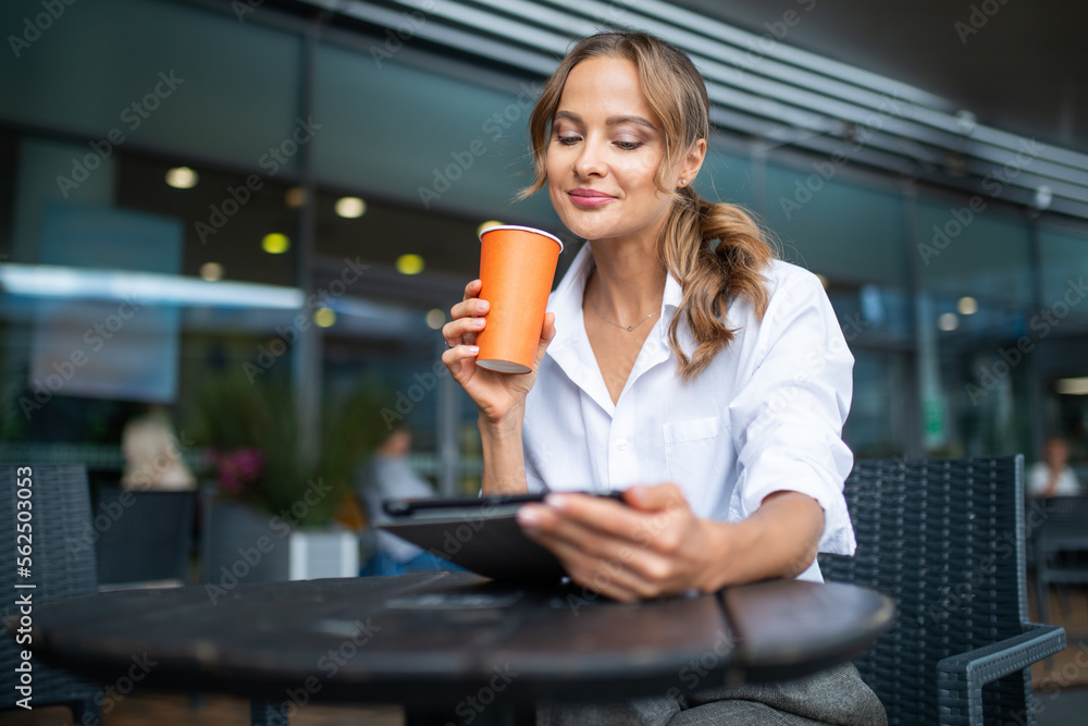 Businesswoman drinking a coffee