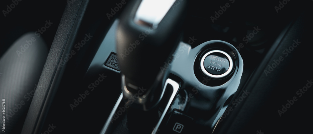 Close up Start Engine and Stop button. The power-on/off button inside a car.
