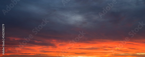 Dramatic blue sky panorama at orange sunset