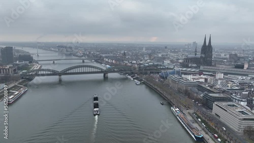 Cologne. Aerial view of downtown Cologne city center. River rhine, skyline, Cologne Cathedral and the Hohenzollernbrucke. Train station and infrastructure. photo