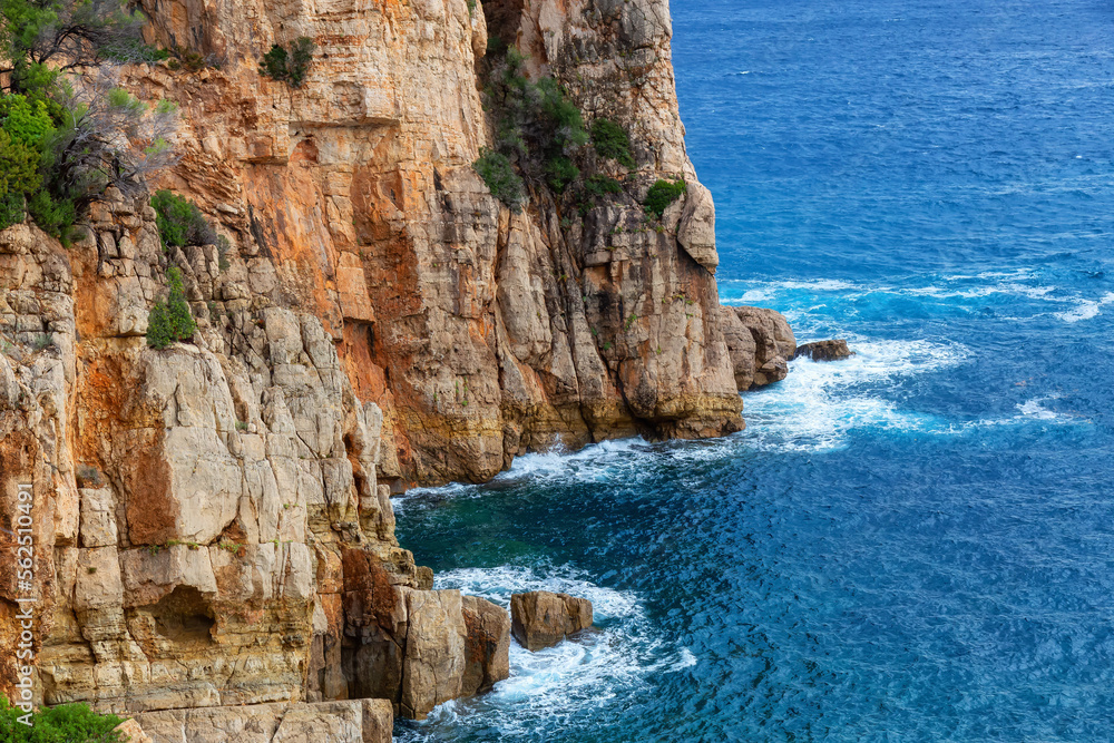 Fototapeta premium Rocky Coast on the Sea in Pedra Longa, Sardinia, Italy. Nature Landscape Background