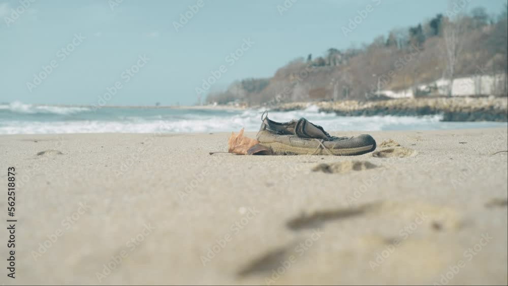 Missing drowned Refugee body rescue mission. Thousands of refugees drown on their way to Europe. Discarded personal belongings of refugees washed up on shoreline. Missing drowned Refugee body rescue mission. Thousands of refugees drown on their way to Europe. Discarded personal belongings of refugees washed up on shoreline.