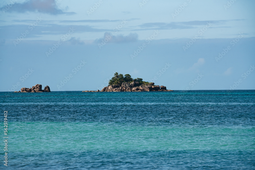 Rocky island off Cote D'Or in the evening light off the Seychelles.