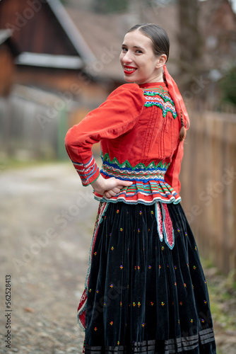 Young beautiful slovak woman in traditional dress. Slovak folklore