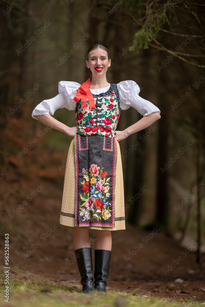 Young beautiful slovak woman in traditional dress. Slovak folklore Young beautiful slovak woman in traditional dress. Slovak folklore