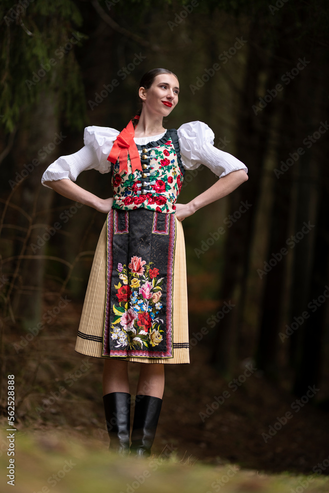 Young beautiful slovak woman in traditional dress. Slovak folklore Young beautiful slovak woman in traditional dress. Slovak folklore