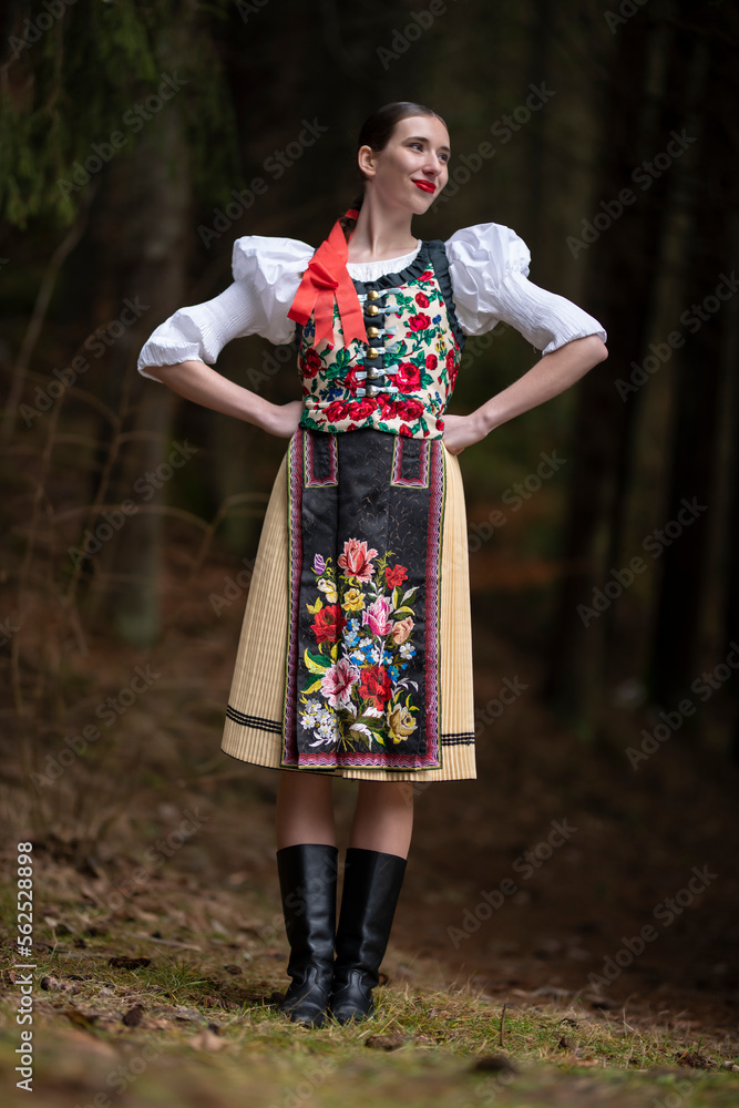Young beautiful slovak woman in traditional dress. Slovak folklore Young beautiful slovak woman in traditional dress. Slovak folklore