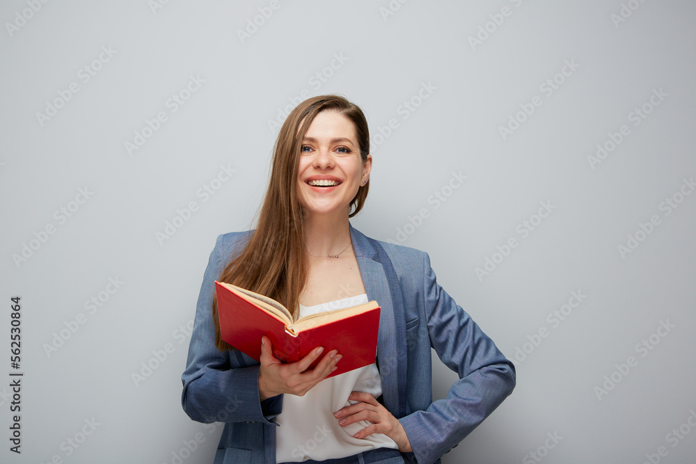 Happy woman teacher or student girl portrait with red book.. Happy woman teacher or student girl portrait with red book..