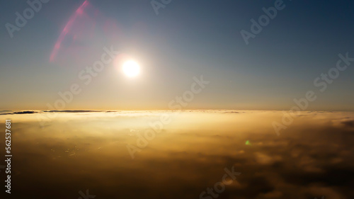 Morning, sunrise with a beautiful pink glow. Shooting with a drone above the morning fog. © Володимир Овчаров