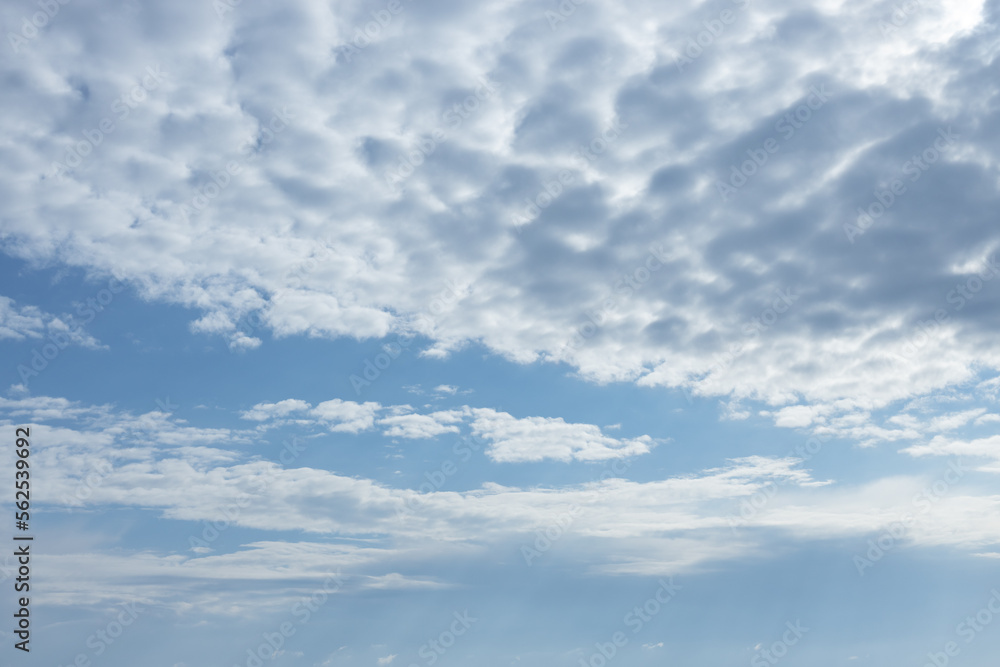 cloudy bright blue sky on a sunny day. High quality photo cloudy bright blue sky on a sunny day. High quality photo
