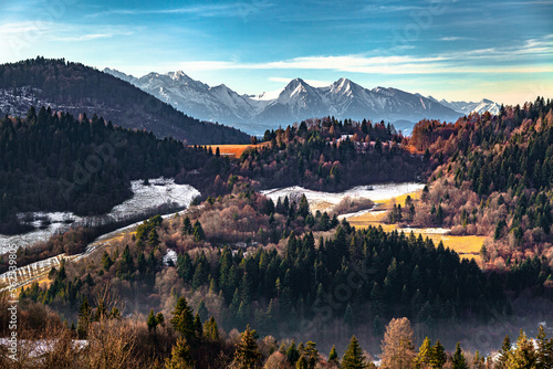 Obraz na płótnie The awsome view of Tatra Mountains behind the colorful mixed forest, Poland w salonie