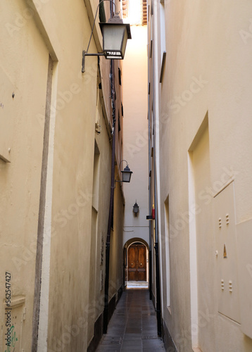 Narrow street in Seville Old Town in Spain