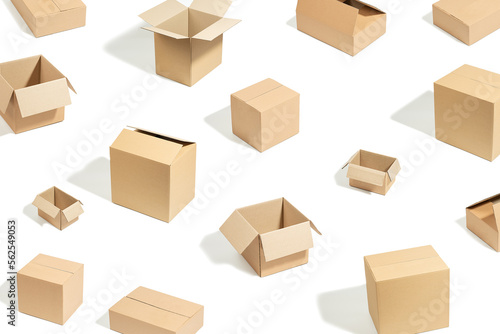 beige cardboard boxes on isolated white background © Berzyk