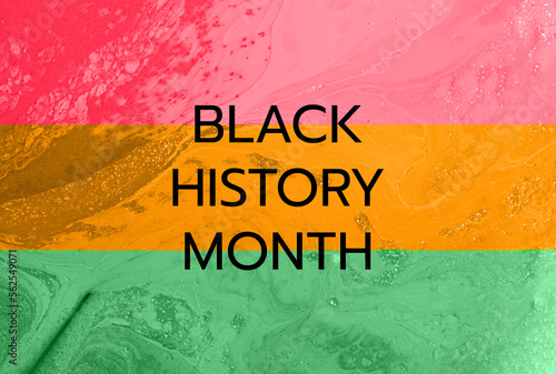 Liquid texture,colored in red,orange and green colors.Symbol of black history month.