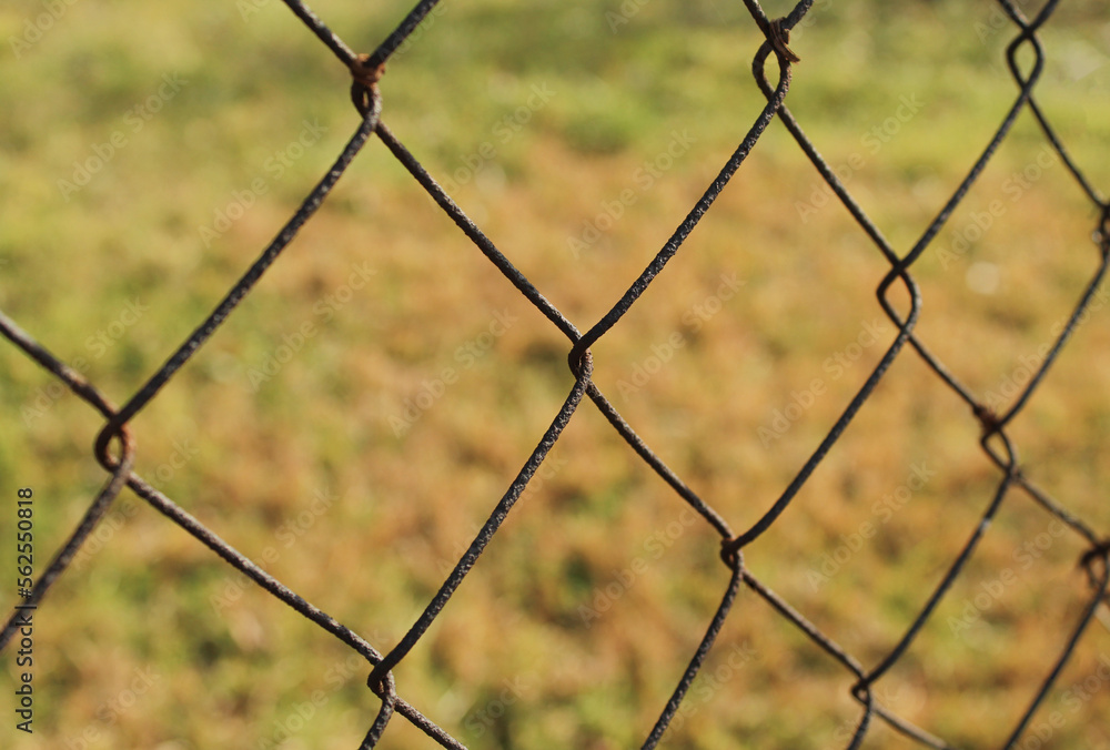 Rusty chain link fence outdoor nature field close-up shot Rusty chain link fence outdoor nature field close-up shot