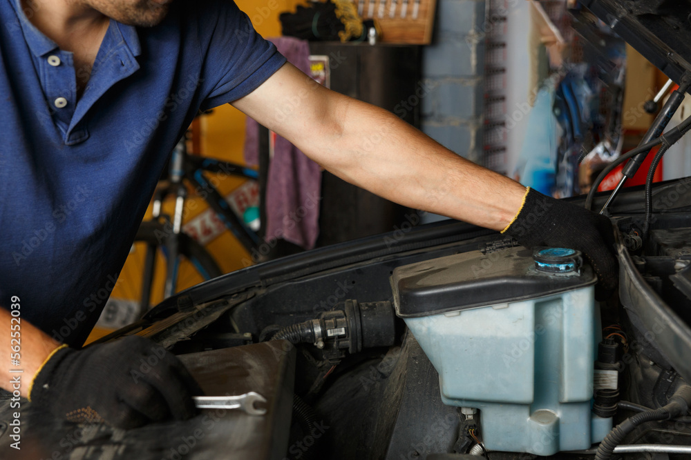 custom made wallpaper toronto digitalCar service, repair, maintenance and people concept - auto mechanic looking for a malfunction in the car engine.