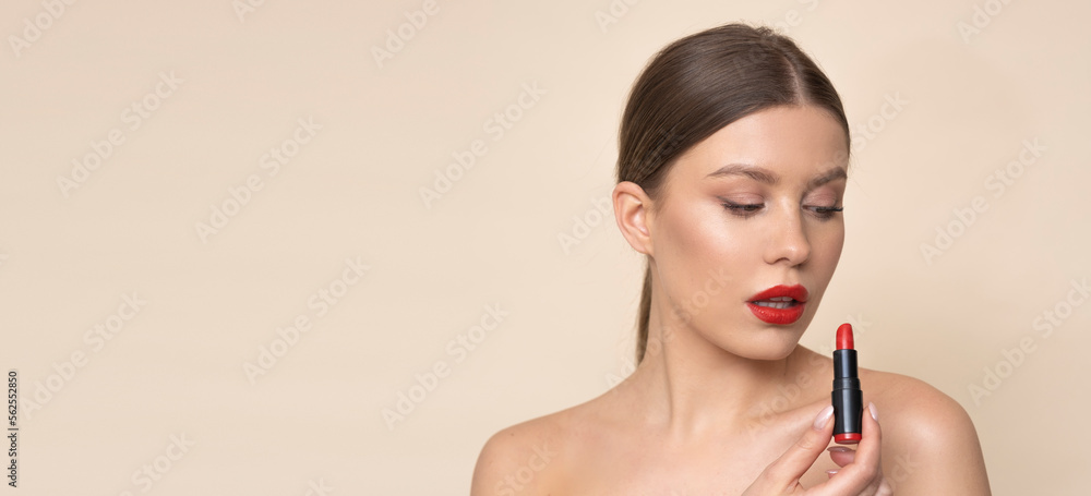 Beauty female with red lips on light brown background. Beauty female with red lips on light brown background.