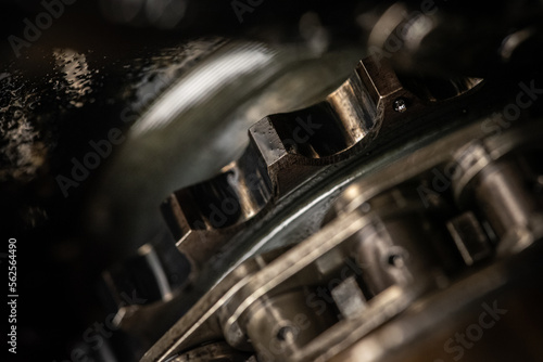 Close up of failed timing chain on a cog ready for replacement photo