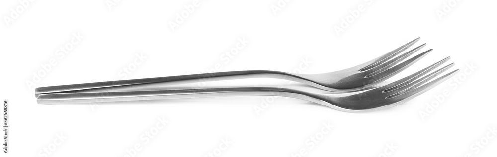 Clean shiny metal forks on white background Clean shiny metal forks on white background