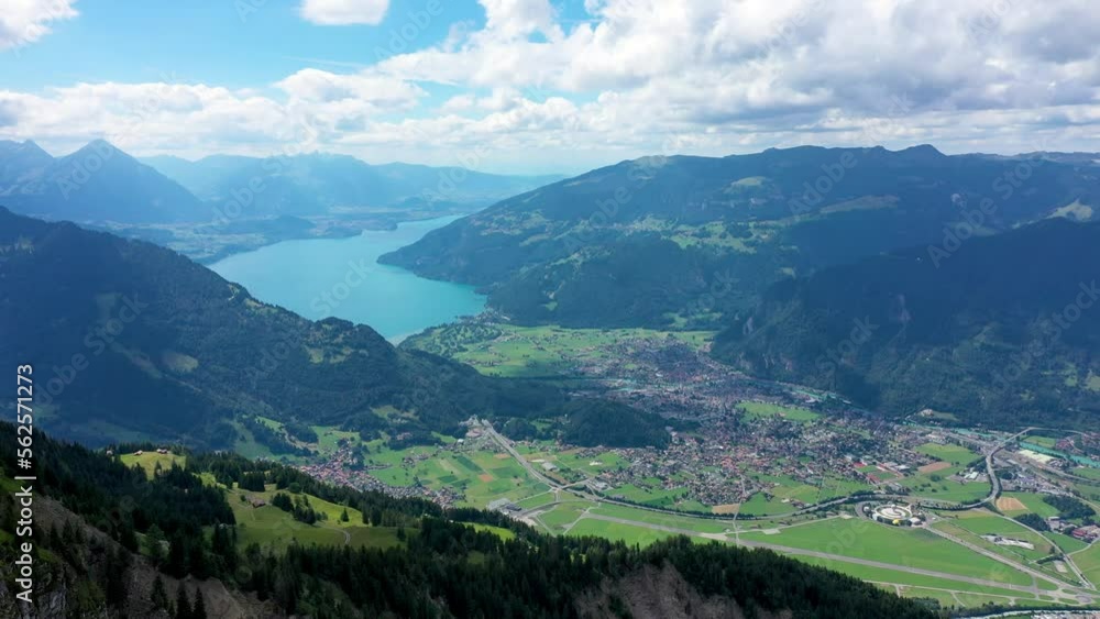 Beautiful Lake Brienz view from Schynige Platte trail in Bernese Oberland, Canton of Bern, Switzerland. Popular mountain in the Swiss Alps called Schynige Platte in Switzerland, aerial view. Beautiful Lake Brienz view from Schynige Platte trail in Bernese Oberland, Canton of Bern, Switzerland. Popular mountain in the Swiss Alps called Schynige Platte in Switzerland, aerial view.
