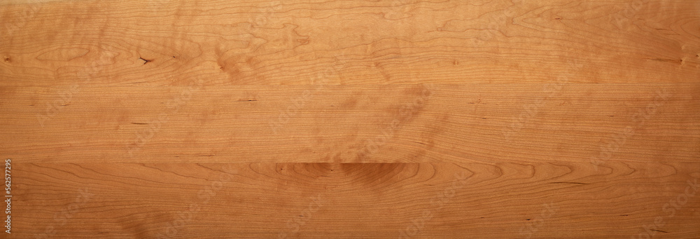 Cherry wood planks long tabletop texture background. Cherry wood planks long tabletop texture background.