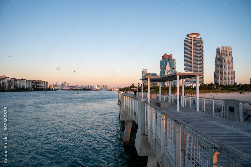 South Point Pier and entrance to Port Miami in Miami Beach, Florida in early morning light on clear cloudless sunny day.
