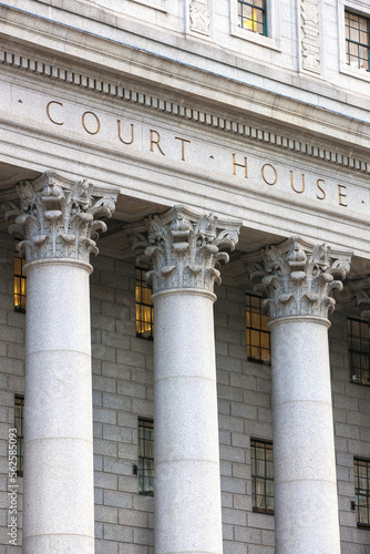 Facade of federal courthouse with towering columns. 
