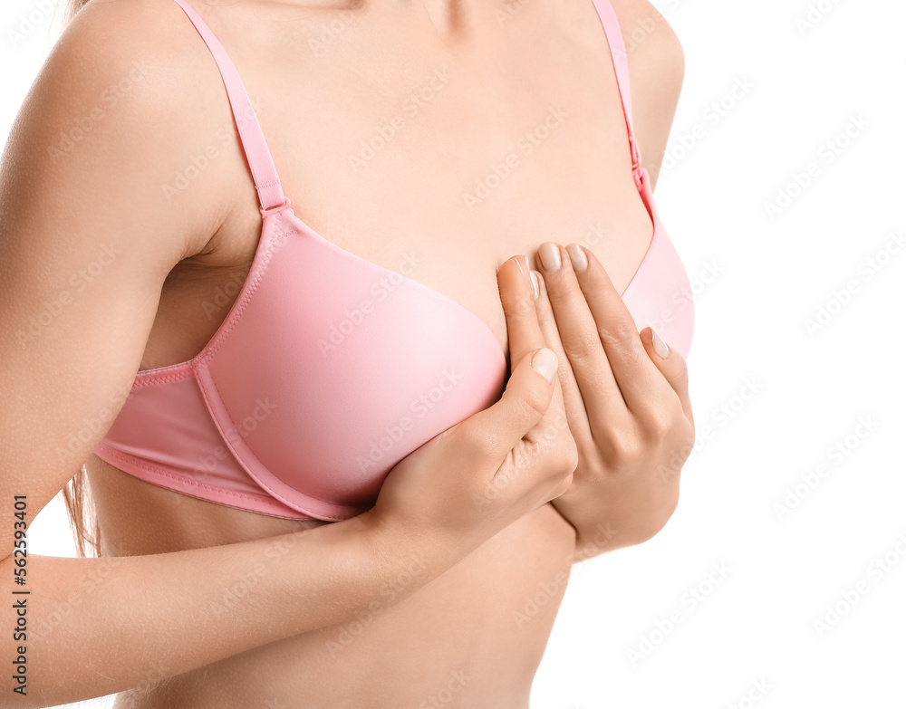 Young woman in underwear on white background, closeup. Breast cancer awareness concept