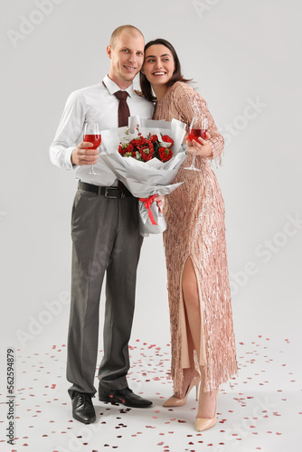 Young couple with glasses o...