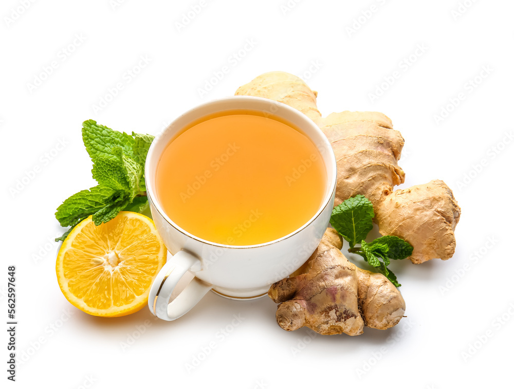 Fresh ginger roots, lemon and cup of tea isolated on white background Fresh ginger roots, lemon and cup of tea isolated on white background