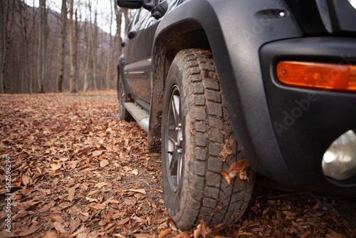 black SUVs in the mountains