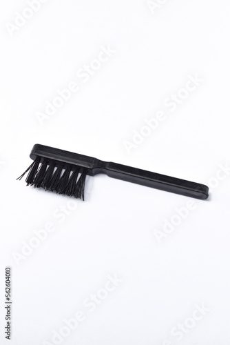 Small cleaning brush isolated on white background. To clean between the dirt on objects