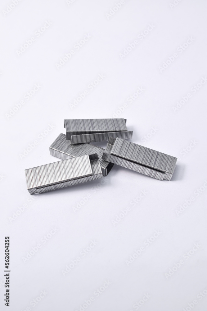 Pile of metal staples for stapler isolated on white background Pile of metal staples for stapler isolated on white background