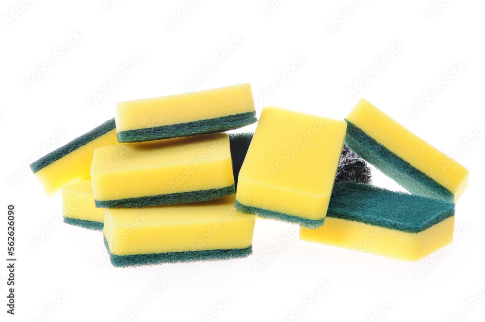 Brightly colored sponges on white background with copy space Brightly colored sponges on white background with copy space
