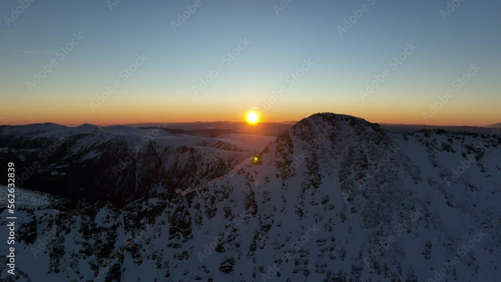 Drone shot from Musala peak (2925m) during sunrise, Bulgaria, Rila mountain, highest peak on the Balkans, golden hour, blue hour, dawn Drone shot from Musala peak (2925m) during sunrise, Bulgaria, Rila mountain, highest peak on the Balkans, golden hour, blue hour, dawn