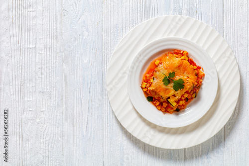 enchilada casserole with veggies, corn, pinto bean photo