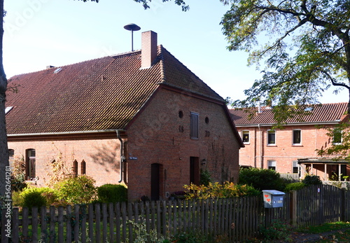 Historical Farm in Autumn in the Village Fulde, Lower Saxony photo