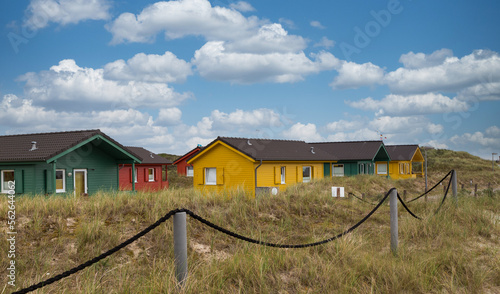 Beautiful and colorful wooden houses on the beach of the island Heligoland - Dune. © eddi_m