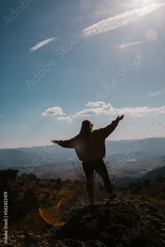 Woman having trekking at sunny day in autumn in Turkey. Travelling concept. 