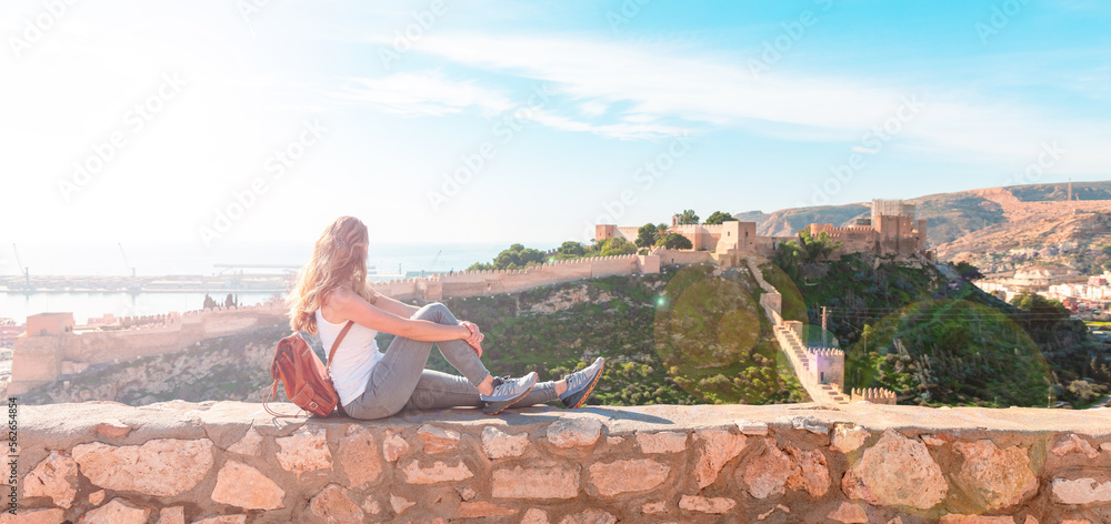 traveler woman looking at panoramic view of Alcazaba in Almeria- Spain
