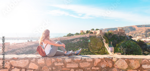 traveler woman looking at panoramic view of Alcazaba in Almeria- Spain