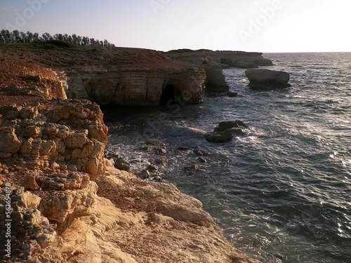 Water caves and rock formations close to Coral Bay on Cyprus Island.