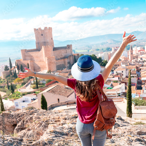 Happy woman tourist in Alicante province- Villena castle, Atalaya in Costa blanca- Spain photo