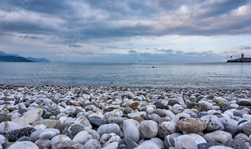 Beautiful sea view with clouds over the mountains