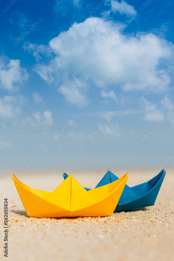 colorful paper boats at the tropical beach colorful paper boats at the tropical beach